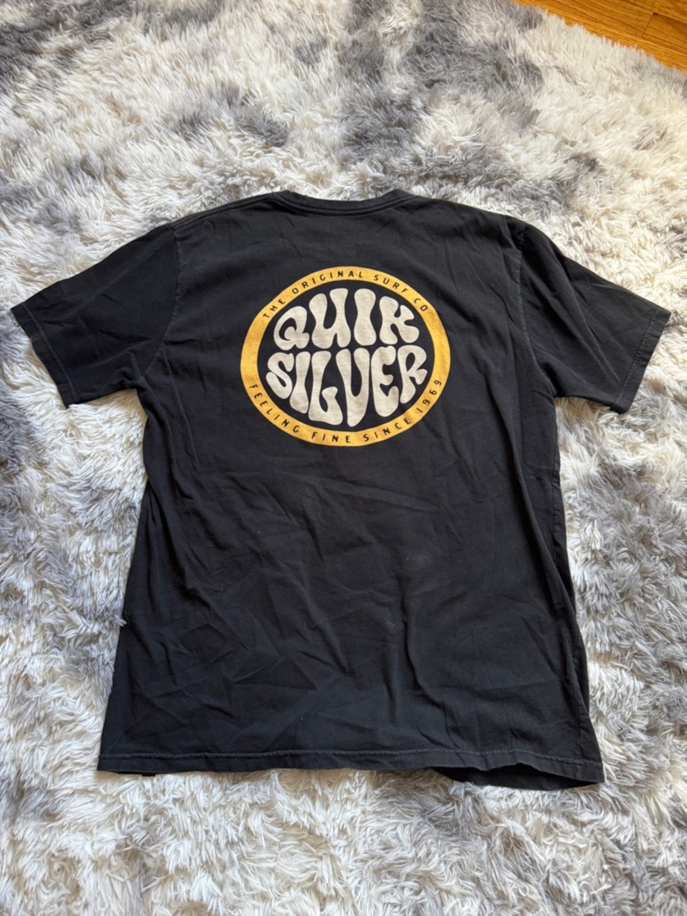 Quiksilver Black Short-Sleeve Tee with Gold Circular Logo